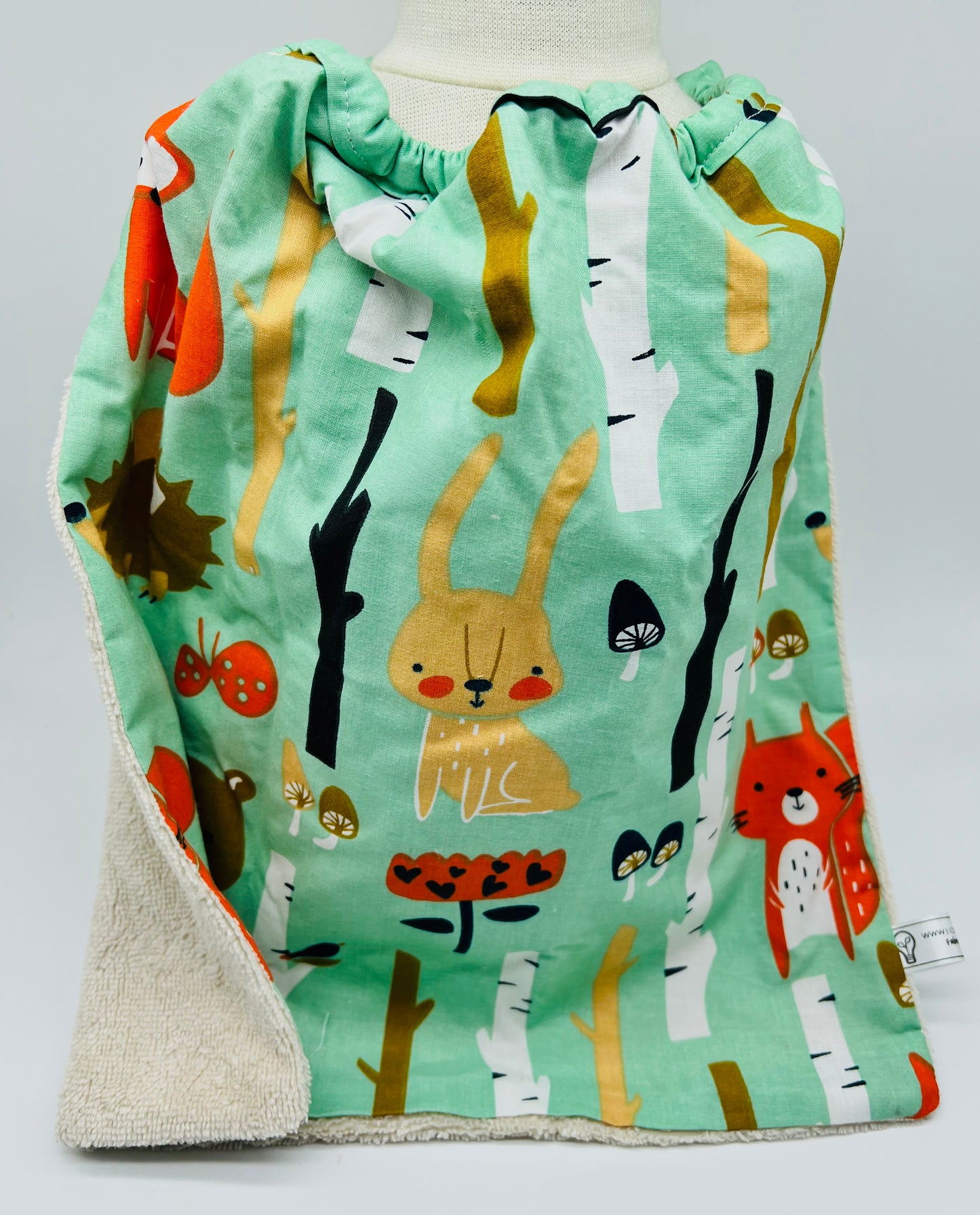 Serviette enfant avec élastique doublée éponge